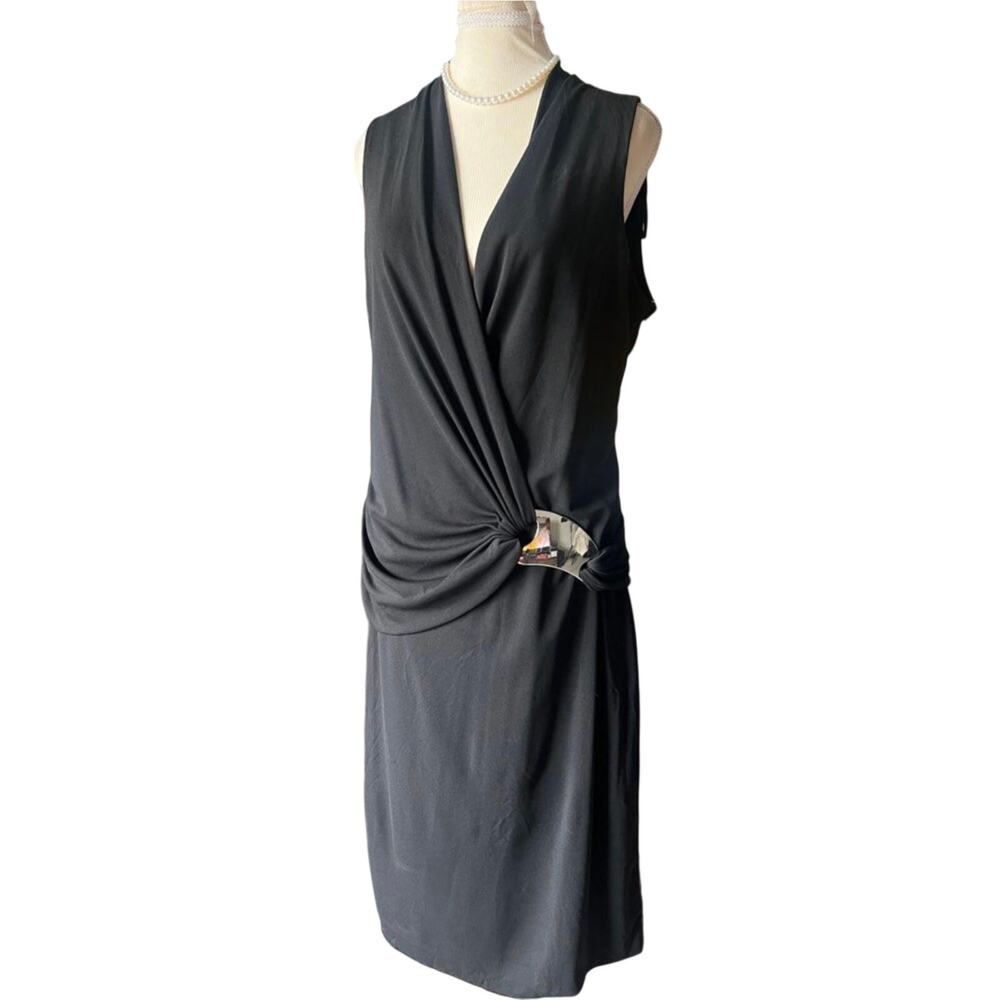 DKNY gorgeous cocktail dress with beautiful metal design.